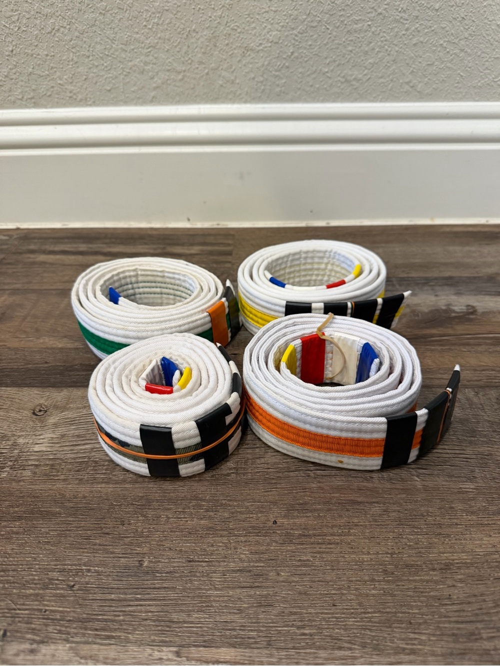 White Martial Arts Belt Set with Orange, Green, Blue, Yellow & Red Rank Stripes